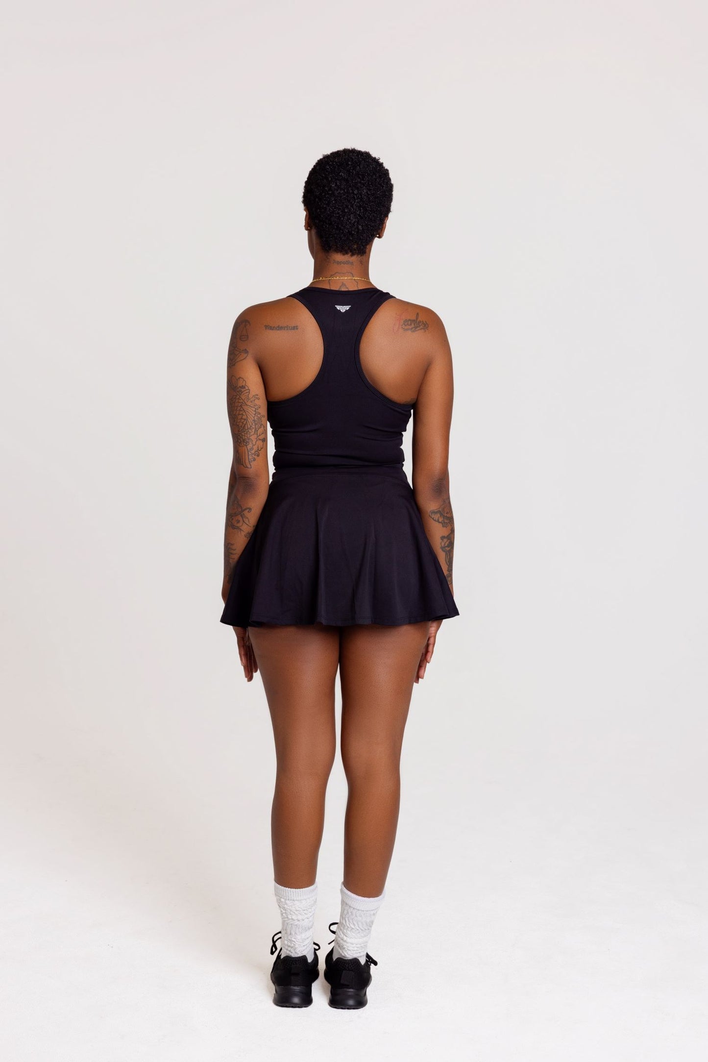 Zip & Sleek Tennis Mini Dress